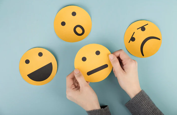 How do language learners' emotions influence their motivation to learn a language?